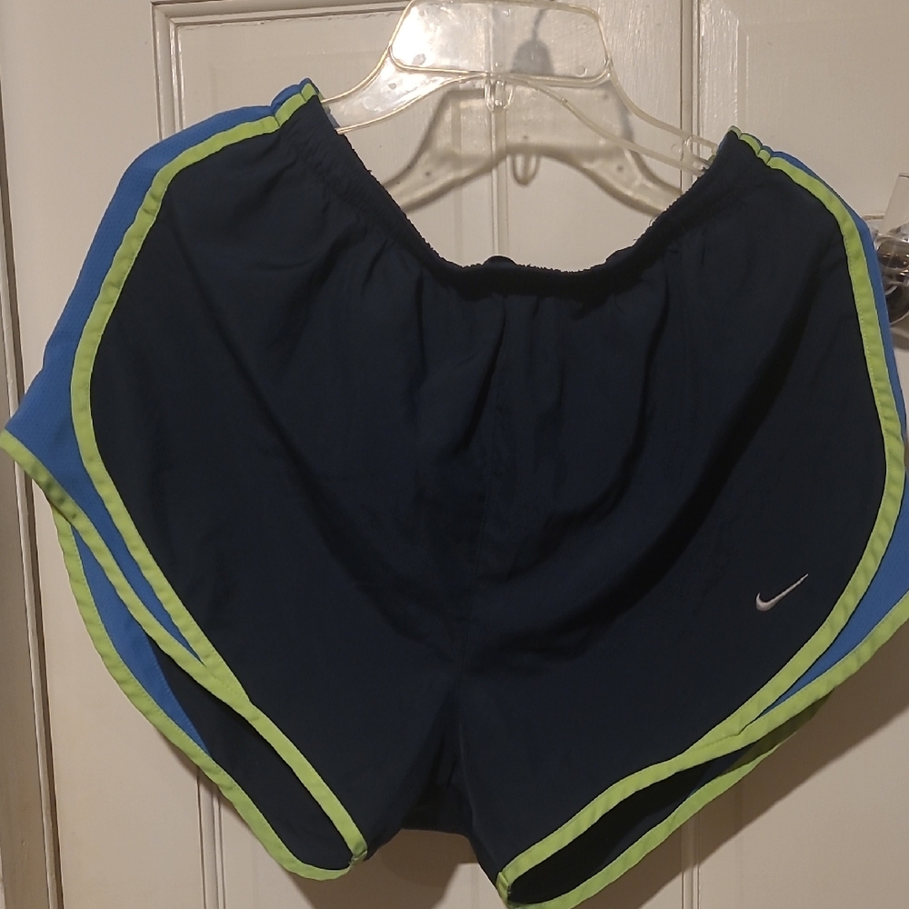 Nike Women's Dark Blue Athletic Shorts with Lime Accents